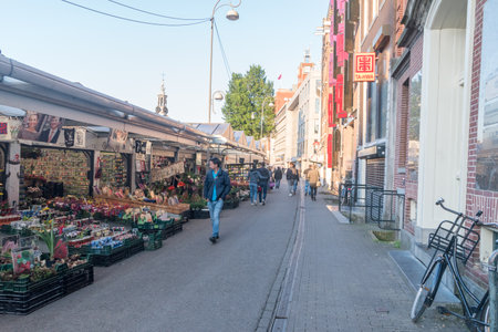 Amsterdam, Netherlands - June 6, 2019: The Amsterdam Flower Market with people.のeditorial素材