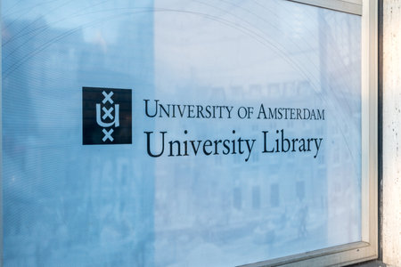Amsterdam, Netherlands - June 6, 2019: Logo and inscription University Library belong to University...