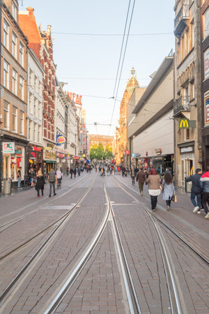 Amsterdam, Netherlands - June 6, 2019: View of Reguliersbreestraat street at sunset time.のeditorial素材