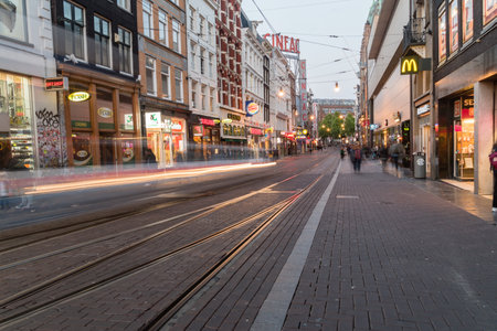Amsterdam, Netherlands - June 6, 2019: View of Reguliersbreestraat street in the evenign.のeditorial素材