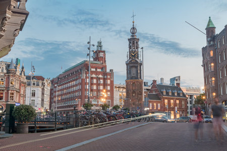 Amsterdam, Netherlands - June 6, 2019: The Munttoren (Mint Tower) or Munt tower in the evening.のeditorial素材