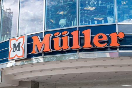Wolfsburg, Germany - June 8, 2019: Muller sing on storefront in Wolfsburg.のeditorial素材
