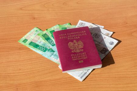 Polish biometric passport and Russian Currency.の写真素材