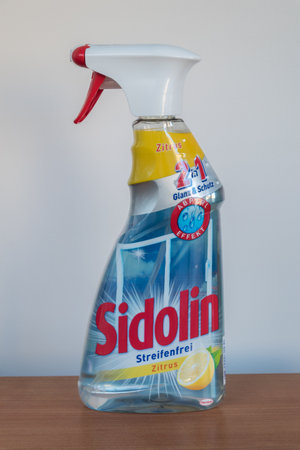 Pruszcz Gdanski, Poland - June 9, 2019: Spray for cleaning glass and windows of Sidolin with a lemon scent.のeditorial素材