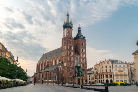 Krakow, Poland - July 26, 2019: St. Mary's Basilica at sunset time.のeditorial素材