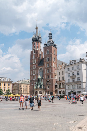 Krakow, Poland - July 26, 2019: Market square with tourists.のeditorial素材