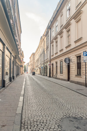 Krakow, Poland - July 27, 2019: Sunset view of Swietego Marka street in old town of Krakow.のeditorial素材