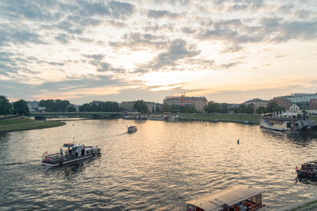 Krakow, Poland - July 27, 2019: Sunset view over vistula river in old town of Krakow.のeditorial素材
