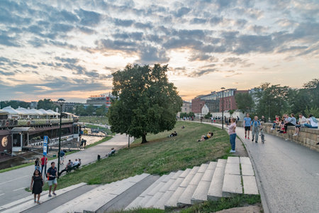 Krakow, Poland - July 27, 2019: Vistulan Czerwienski Boulevards at sunset in Krakow.のeditorial素材