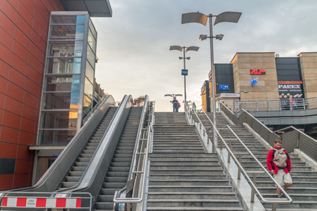 Krakow, Poland - July 28, 2019: Stairs to MDA bus station from Krakow Glowny railway station at sunrise time.のeditorial素材