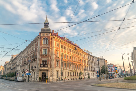 Krakow, Poland - July 28, 2019: Hotel Polonia and Hotel Warszawski in the early morning. Sunrise view on the corner Basztowa and Pawia street.のeditorial素材
