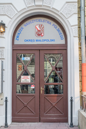 Krakow, Poland - July 28, 2019: Entrance door to Lesser Poland District of Polish Teachers' Union. Polish Teachers' Association, Association of Polish Teachers.のeditorial素材