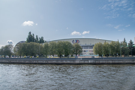 Kaliningrad, Russia - August 4, 2019: Pregolya river with sport hall in background in Kaliningrad oblast.のeditorial素材