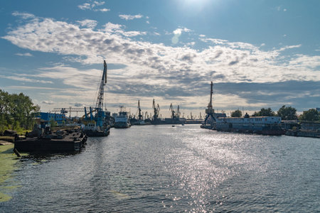 Kaliningrad, Russia - August 4, 2019: Cranes on Pregolya river.のeditorial素材