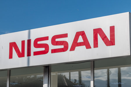Kaliningrad, Russia - August 4, 2019: Nissan sign on car dealership.のeditorial素材
