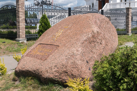 Kaliningrad, Russia - August 5, 2019: Stone next to Orthodox church of Khram Svyatogo Aleksandra Nevskogo.のeditorial素材