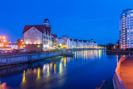Kaliningrad, Russia - August 5, 2019: Night view of Pregolya River with Fishing Village.のeditorial素材
