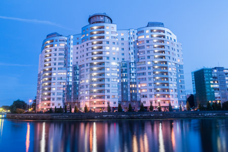 Kaliningrad, Russia - August 5, 2019: Night view of Pregolya river with modern skyscraper.のeditorial素材