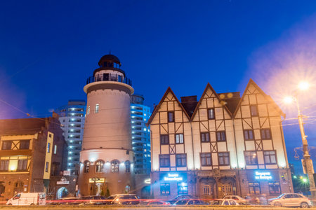 Kaliningrad, Russia - August 5, 2019: Night view of Fishermen's village with lighthouse.のeditorial素材