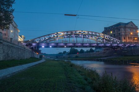 Milos Sykora bridge over Ostravice river at night in Ostrava, Czech Republic.の写真素材