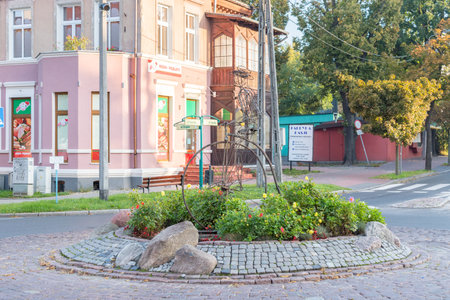 Kwidzyn, Poland - September 22, 2019: Roundabout with bicycle sculpture.のeditorial素材
