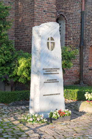 Kwidzyn, Poland - September 22, 2019: Memorial stone to pope John Paul II. Stone next to Kwidzyn castle.のeditorial素材
