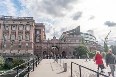 Stockholm, Sweden - September 24, 2019: Riksgatan street with entrance gate to Swedish parliament in Gamla Stan.のeditorial素材