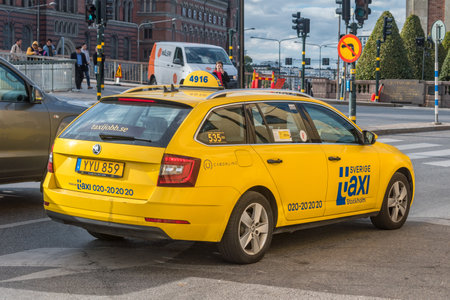 Stockholm, Sweden - September 24, 2019: Yellow Sverige taxi in Stockholm.のeditorial素材