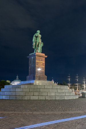 Stockholm, Sweden - September 24, 2019: Gustav as Apollo Belvedere dressed in the uniform of the Swedish Coastal Navy (Skargardsflottan) at night.のeditorial素材