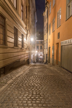 Stockholm, Sweden - September 24, 2019: Prastgatan street on Gamla Stan at night.のeditorial素材