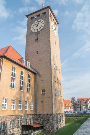 Szczytno, Poland - October 31, 2019: Clock tower of town hall Szczytno.のeditorial素材