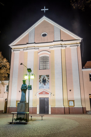 Lomza, Poland - October 31, 2019: Church of Order of Friars Minor Capuchin at night.のeditorial素材