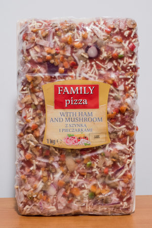 Pruszcz Gdanski, Poland - January 9, 2020: Family pizza with ham and mushroom.のeditorial素材