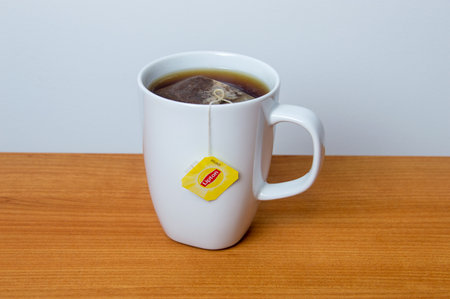 Pruszcz Gdanski, Poland - January 12, 2020: Lipton Yellow Label tea mug. Lipton Yellow Label is a brand sold in 150 countries worldwide.のeditorial素材
