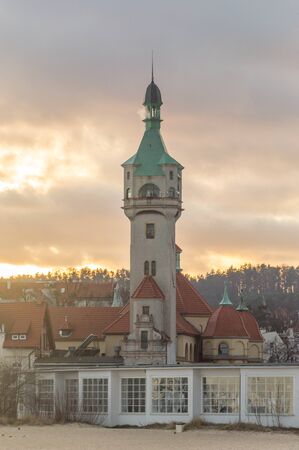 Beautiful sunset view of Sopot lighthouse on Baltic sea.の写真素材