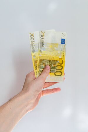 200 Euro bills held in hand.の写真素材