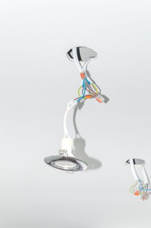 Close up on pot light not inserted to ceiling tile.の写真素材
