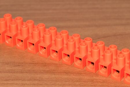 Orange terminal block connector for electric wires.の写真素材