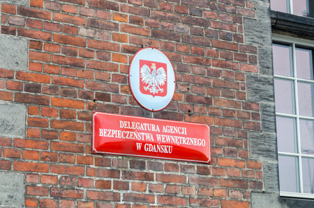Gdansk, Poland - January 27, 2020: Polish emblem and information about Agencja Bezpieczenstwa Wewnetrznego (ABW; English: Internal Security Agency, ISA).のeditorial素材