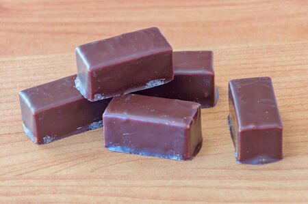 Ptasie mleczko marshmallow covered in chocolate.の写真素材