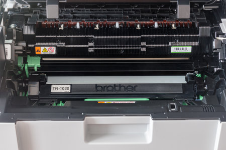 Pruszcz Gdanski, Poland - March 9, 2020: Close-up on toner TN1030 inside Brother DCP-1610WE Compact Mono Laser.のeditorial素材