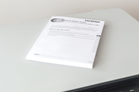 Pruszcz Gdanski, Poland - March 9, 2020: Product Safety Guide for Brother DCP-1610WE Compact Mono Laser All-In-One Printer with Wi-Fi.のeditorial素材