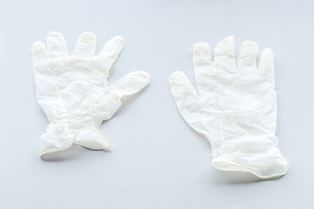 White medical latex gloves for protection.の写真素材
