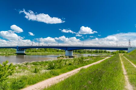 Brige over Bug river at summer time.の写真素材