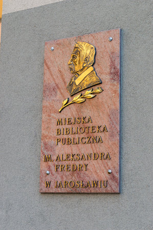 Jaroslaw, Poland - June 12, 2020: Information plaque of Municipal public library in Jaroslaw.のeditorial素材