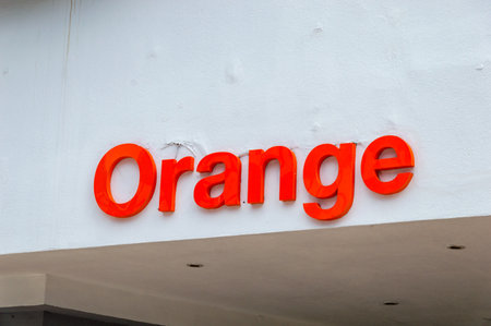 Zakopane, Poland - June 14, 2020: Logo and sign of Orange mobile company. Orange formerly France Telecom, is a French multinational telecommunications corporation.のeditorial素材
