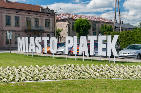 Piatek, Poland - June 16, 2020: City Piatek sign in Polish language near Geometric center of Poland.のeditorial素材
