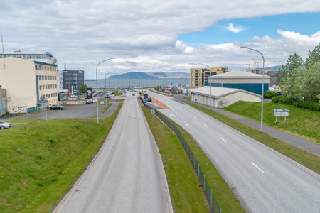 Reykjavik, Iceland - June 19, 2020: Street and sea view in Reykjavik capital city of Iceland.のeditorial素材