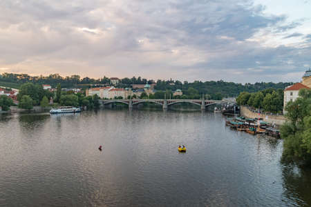 Panoramic view of Vltava river in Prague at sunset time.の写真素材