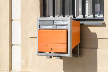 Prague, Czech Republic - July 10, 2020: Orange post office box of Czech post.のeditorial素材